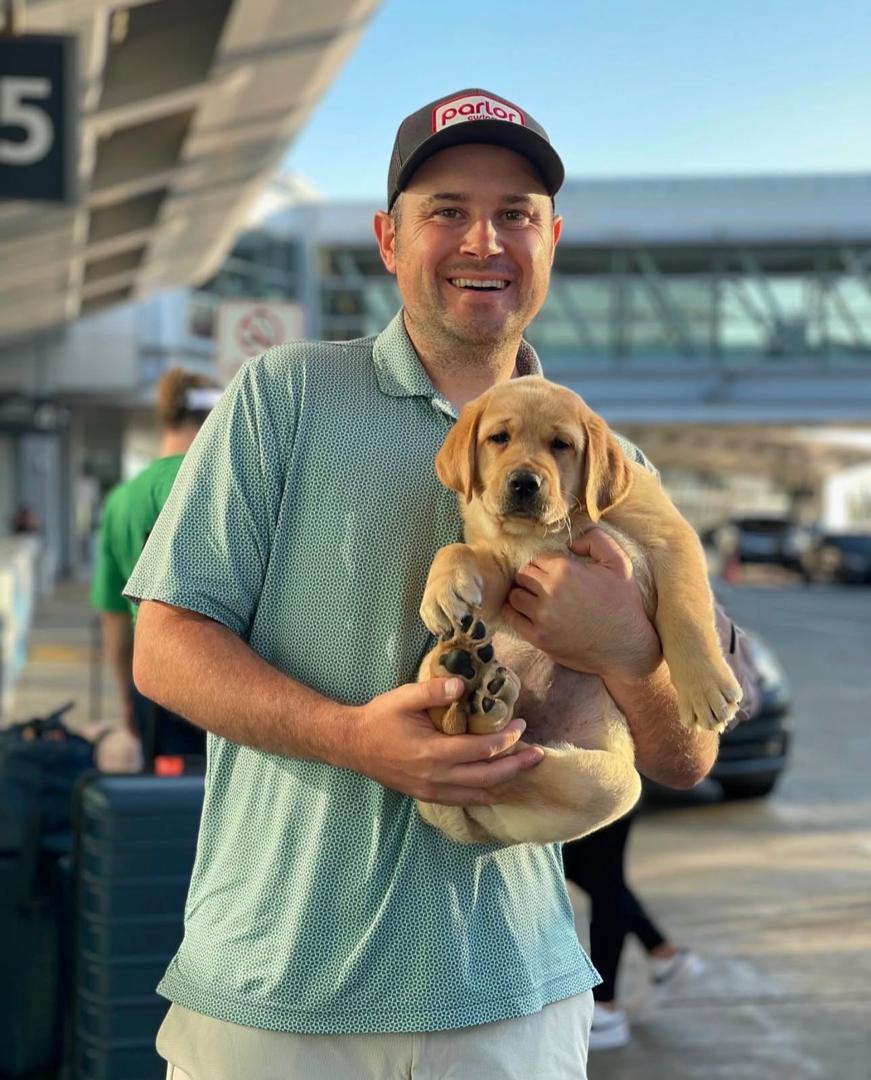 Family with Labrador