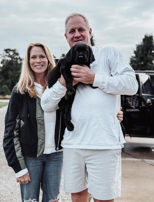 Family with Labrador